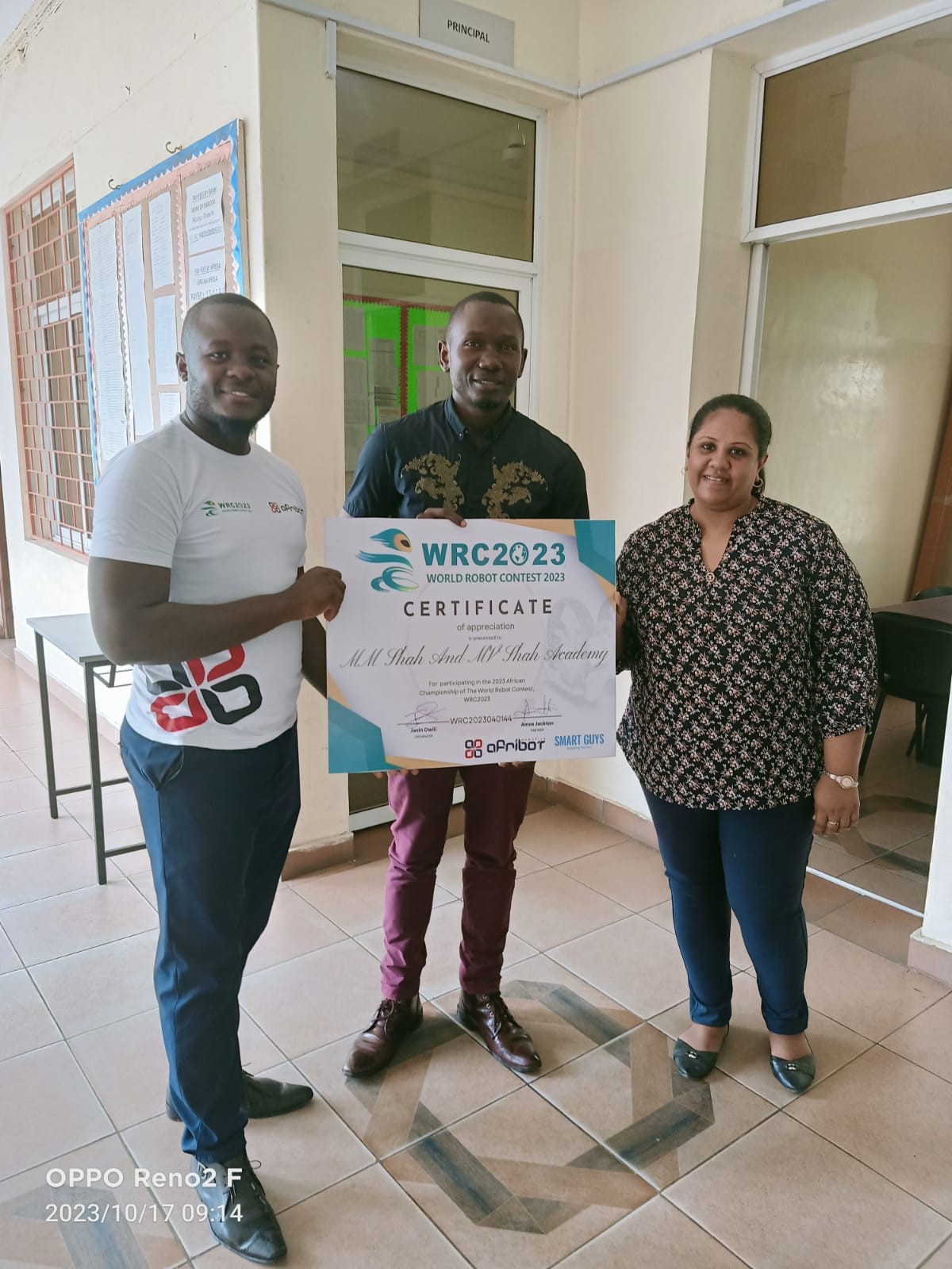 Team receiving robotics certificate